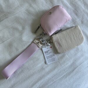 60-61🆕 Lululemon Dual Pouch Wristlet - White Opal / Meadowsweet Pink